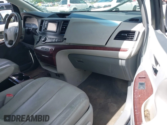 2014 Toyota Sienna XLE with VIN 5TDYK3DC4ES414728, listed as a IAAI auction lot 42588916 with 291,007 mi miles and . Bid and sale history available at DreamBid. Image 5.
