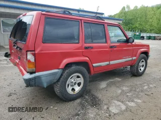 2001 Jeep Cherokee Sport with VIN 1J4FT48S41L570480, listed as a Copart auction lot 56123925 with 216,338 mi miles and Salvage title. Bid and sale history available at DreamBid. Image 3.