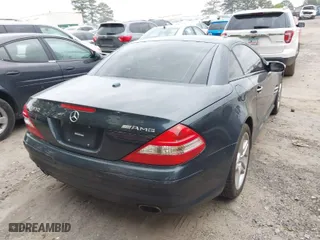 2007 Mercedes-Benz SL-Class 5.5L V8 with VIN WDBSK71F07F134494, listed as a IAAI auction lot 42032663 with 136,806 mi miles. Bid and sale history available at carsss.com. Image 4.