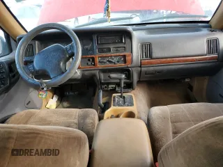 1996 Jeep Grand Cherokee Laredo with VIN 1J4GZ58Y0TC162591, listed as a Copart auction lot 43027025 with 383,318 mi miles and Salvage Title. Bid and sale history available at carsss.com. Image 8.