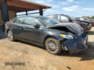 2016 Ford Fusion Titanium z VIN 3FA6P0K98GR151640, wystawiony jako Copart lot #73254594 z przebiegiem 145 473 mil mil oraz Szkoda całkowita • Salvage title. Historia ofert i sprzedaży dostępna na DreamBid. Obrazek 4.