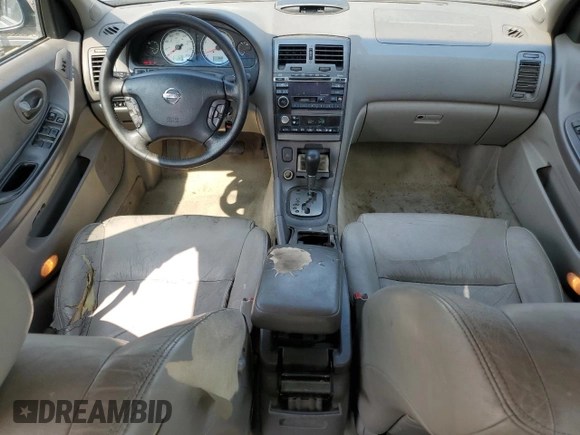 2002 Nissan Maxima GLE z VIN JN1DA31A62T000726, wystawiony jako Copart lot #71235864 z przebiegiem 219 647 mil mil oraz Szkoda całkowita • Salvage title. Historia ofert i sprzedaży dostępna na DreamBid. Obrazek 8.