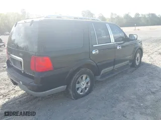 2004 Lincoln Navigator Luxury with VIN 5LMFU28RX4LJ15831, listed as a IAAI auction lot 41969032 with 194,600 mi miles. Bid and sale history available at carsss.com. Image 4.