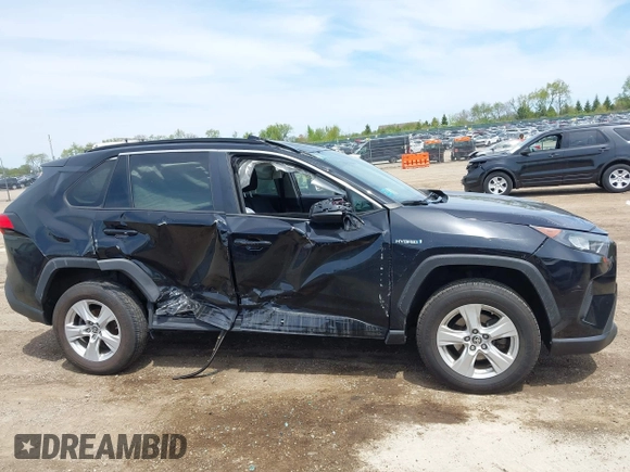 2021 Toyota RAV4 Hybrid LE with VIN 2T3L6RFV7MW011159, listed as a IAAI auction lot 42212998 with 104,626 mi miles and . Bid and sale history available at DreamBid. Image 13.