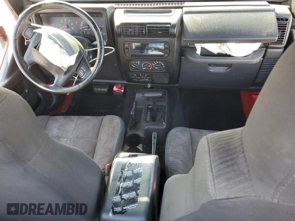 2003 Jeep Wrangler Sport z VIN 1J4FA49S33P302780, wystawiony jako Copart lot #60354805 z przebiegiem 201 679 mil mil oraz Szkoda całkowita • Salvage title. Historia ofert i sprzedaży dostępna na DreamBid. Obrazek 8.