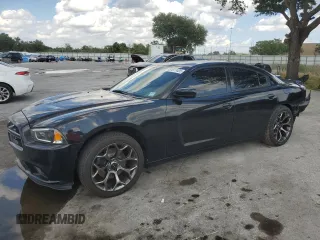 2012 Dodge Charger SXT with VIN 2C3CDXJG8CH132658, listed as a Copart auction lot 51077405 with 136,628 mi miles and Salvage Title. Bid and sale history available at carsss.com. Image 1.