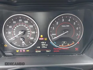 2015 BMW 2 Series M235i with VIN WBA1J7C50FV358774, listed as a IAAI auction lot 41559637 with 82,344 mi miles and . Bid and sale history available at carsss.com. Image 7.