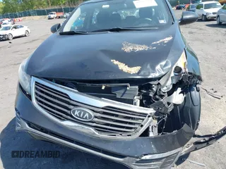 2012 Kia Sportage LX with VIN KNDPB3A28C7187185, listed as a IAAI auction lot 42233774 with 223,235 mi miles and . Bid and sale history available at DreamBid. Image 6.