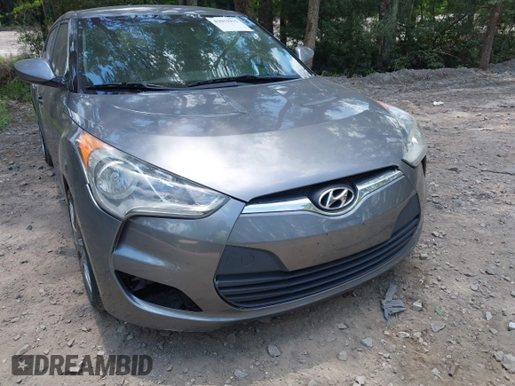 2012 Hyundai Veloster w/Black Int with VIN KMHTC6AD3CU078547, listed as a IAAI auction lot 42633915 with 143,633 mi miles and . Bid and sale history available at DreamBid. Image 12.