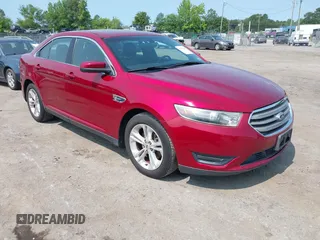 2014 Ford Taurus SEL z VIN 1FAHP2E85EG162669, wystawiony jako IAAI lot #42423444 z przebiegiem 103 859 mil mil oraz . Historia ofert i sprzedaży dostępna na DreamBid. Obrazek 1.