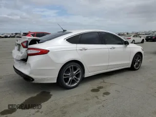 2014 Ford Fusion Titanium with VIN 3FA6P0K97ER393249, listed as a Copart auction lot 53087355 with 148,266 mi miles and Salvage Title. Bid and sale history available at DreamBid. Image 3.