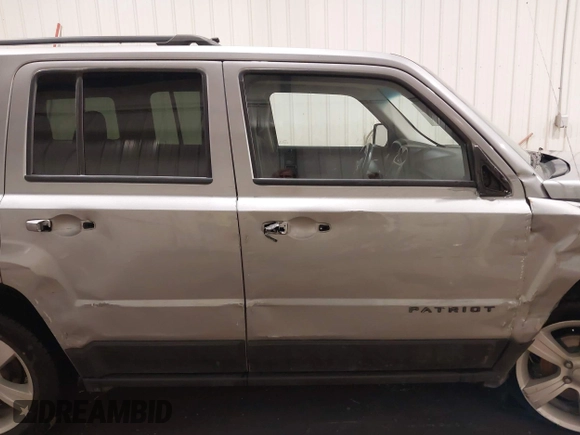 2016 Jeep Patriot Latitude with VIN 1C4NJRFB0GD581213, listed as a IAAI auction lot 42407888 with 104,202 mi miles and . Bid and sale history available at DreamBid. Image 14.