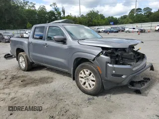 2022 Nissan Frontier SV with VIN 1N6ED1EK8NN680666, listed as a Copart auction lot 59164865 with 57,697 mi miles and Salvage title. Bid and sale history available at DreamBid. Image 4.