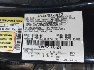 2013 Lincoln MKZ with VIN 3LN6L2J95DR804855, listed as a IAAI auction lot 41264935 with 115,226 mi miles. Bid and sale history available at carsss.com. Image 9.
