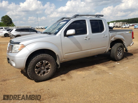 2016 Nissan Frontier Pro-4X with VIN 1N6AD0EV0GN797437, listed as a Copart auction lot 54203245 with 131,021 mi miles and Salvage title. Bid and sale history available at DreamBid. Image 1.
