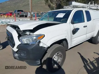 2020 Toyota Tacoma SR with VIN 3TYRX5GNXLT005018, listed as a IAAI auction lot 41851226 with 90,325 mi miles and . Bid and sale history available at DreamBid. Image 6.