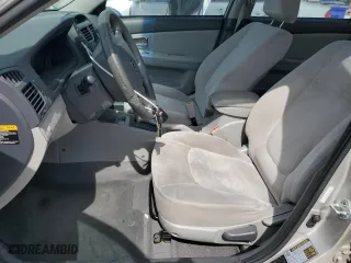 2009 Kia Spectra EX with VIN KNAFE221895621447, listed as a Copart auction lot 58084584 with 187,910 mi miles and Clean Title. Bid and sale history available at carsss.com. Image 7.