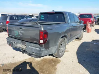 2020 Honda Ridgeline RTL-E with VIN 5FPYK3F72LB011694, listed as a IAAI auction lot 41628184 with 76,011 mi miles. Bid and sale history available at carsss.com. Image 4.