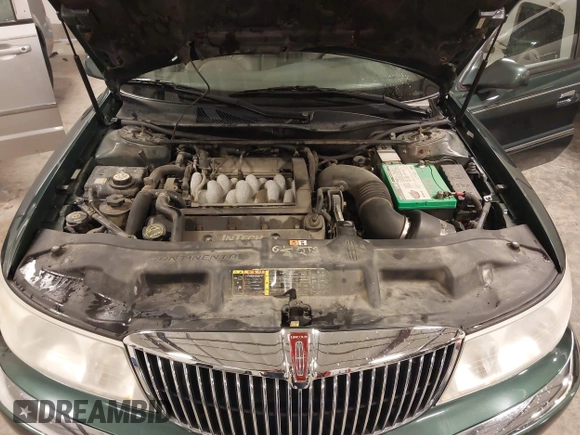 2001 Lincoln Continental with VIN 1LNHM97V11Y691910, listed as a IAAI auction lot 41501779 with 102,715 mi miles and . Bid and sale history available at DreamBid. Image 10.