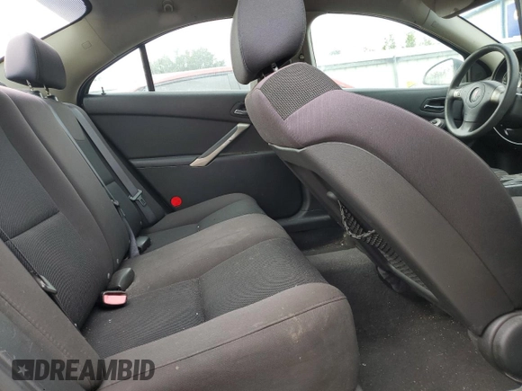 2006 Pontiac G6 GTP z VIN 1G2ZM551364162379, wystawiony jako Copart lot #73416394 z przebiegiem 218 222 mil mil oraz Szkoda całkowita • Salvage title. Historia ofert i sprzedaży dostępna na DreamBid. Obrazek 10.