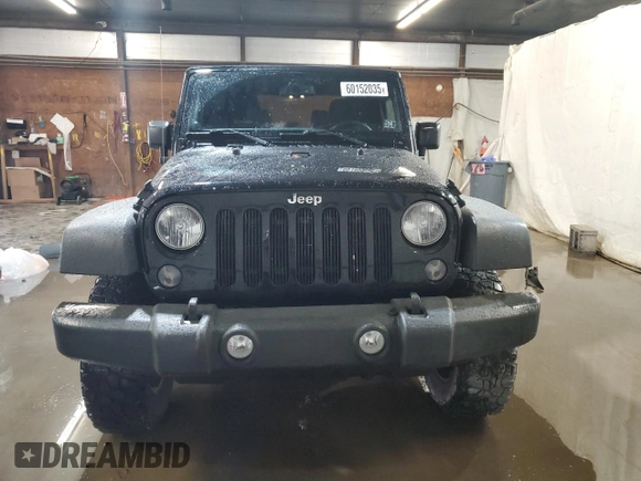 2014 Jeep Wrangler Sport with VIN 1C4AJWAG5EL307945, listed as a Copart auction lot 60152035 with 119,508 mi miles and Salvage title. Bid and sale history available at DreamBid. Image 5.