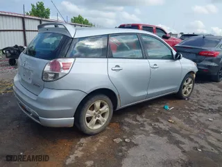 2005 Toyota Matrix STD with VIN 2T1KR32E35C502295, listed as a IAAI auction lot 41444653 with 299,999 mi miles. Bid and sale history available at carsss.com. Image 4.