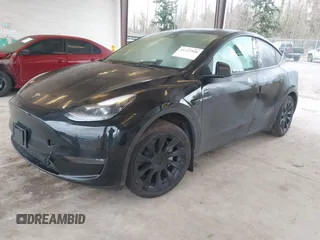 2023 Tesla Model Y Long Range with VIN 7SAYGAEEXPF707503, listed as a IAAI auction lot 41712166 with 27,467 mi miles and . Bid and sale history available at carsss.com. Image 17.