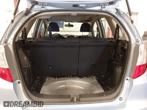 2009 Honda Fit Sport with VIN JHMGE88489S005033, listed as a IAAI auction lot 41861124 with 56,148 mi miles and . Bid and sale history available at DreamBid. Image 14.