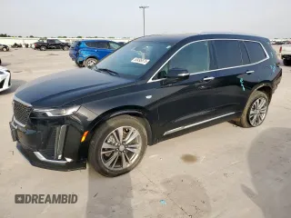2021 Cadillac XT6 Premium Luxury with VIN 1GYKPDRS4MZ176786, listed as a Copart auction lot 55495575 with 66,381 mi miles and Salvage title. Bid and sale history available at DreamBid. Image 1.