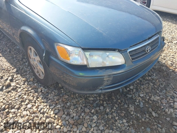 2000 Toyota Camry CE z VIN JT2BG22K5Y0476098, wystawiony jako IAAI lot #42200385 z przebiegiem Nie podano mil oraz . Historia ofert i sprzedaży dostępna na DreamBid. Obrazek 12.