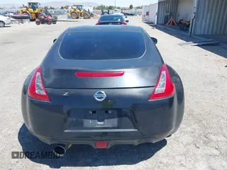 2013 Nissan 370Z z VIN JN1AZ4EH8DM880849, wystawiony jako IAAI lot #42131189 z przebiegiem Nie podano mil oraz . Historia ofert i sprzedaży dostępna na DreamBid. Obrazek 17.