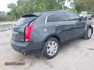 2015 Cadillac SRX with VIN 3GYFNAE30FS569009, listed as a IAAI auction lot 41718522 with 104,448 mi miles and . Bid and sale history available at DreamBid. Image 4.
