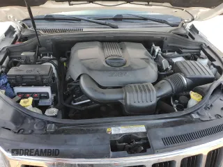 2011 Jeep Grand Cherokee Laredo with VIN 1J4RR4GG4BC640277, listed as a Copart auction lot 52166205 with 195,877 mi miles and Salvage Title. Bid and sale history available at DreamBid. Image 12.