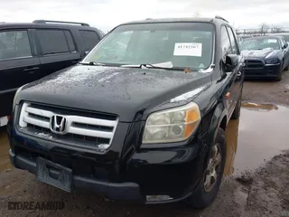 2007 Honda Pilot EX-L with VIN 5FNYF28557B028997, listed as a IAAI auction lot 41742267 with 217,114 mi miles. Bid and sale history available at carsss.com. Image 2.