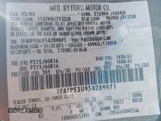 2005 Ford Taurus SE with VIN 1FAFP53U95A289971, listed as a IAAI auction lot 42143134 with 167,702 mi miles. Bid and sale history available at carsss.com. Image 9.