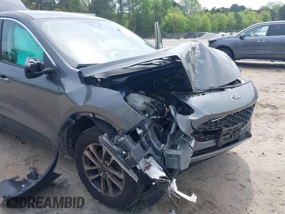 2022 Ford Escape SE with VIN 1FMCU9G64NUB95256, listed as a IAAI auction lot 42010127 with 32,009 mi miles and . Bid and sale history available at DreamBid. Image 6.