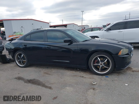 2014 Dodge Charger SE with VIN 2C3CDXBG2EH187978, listed as a IAAI auction lot 41246875 with 106,635 mi miles and . Bid and sale history available at DreamBid. Image 13.