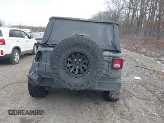 2021 Jeep Wrangler Sport S with VIN 1C4GJXAN9MW768559, listed as a IAAI auction lot 41238254 with 18,191 mi miles and . Bid and sale history available at DreamBid. Image 16.