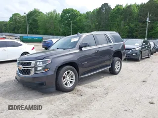 2018 Chevrolet Tahoe LT with VIN 1GNSKBKCXJR103730, listed as a IAAI auction lot 42125208 with 212,360 mi miles and . Bid and sale history available at DreamBid. Image 17.