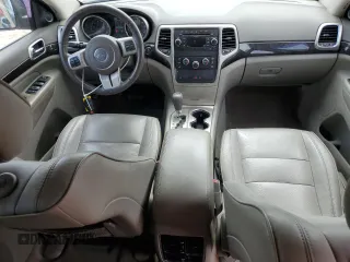 2011 Jeep Grand Cherokee Laredo with VIN 1J4RS4GG4BC537459, listed as a Copart auction lot 50920965 with 112,810 mi miles and Salvage Title. Bid and sale history available at DreamBid. Image 8.