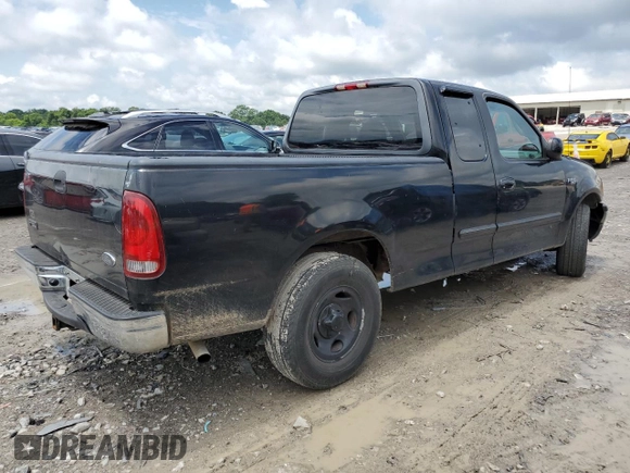 2000 Ford F-150 XL with VIN 1FTZX1720YNB83091, listed as a Copart auction lot 42765835 with 0 mi miles and Salvage Title. Bid and sale history available at carsss.com. Image 3.