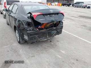 2019 Toyota Corolla L with VIN 5YFBURHE5KP945925, listed as a IAAI auction lot 41493079 with 96,849 mi miles and . Bid and sale history available at carsss.com. Image 6.