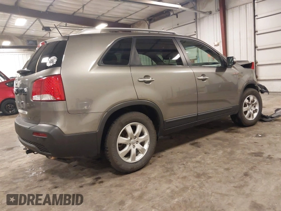 2013 Kia Sorento LX with VIN 5XYKT3A66DG381650, listed as a IAAI auction lot 42400630 with 182,333 mi miles and . Bid and sale history available at DreamBid. Image 4.