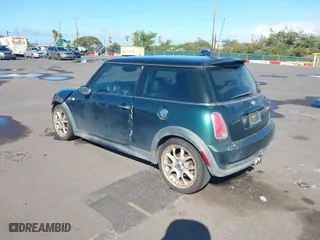 2006 MINI Cooper Hardtop S with VIN WMWRE33566TJ34081, listed as a IAAI auction lot 41265659 with 71,441 mi miles. Bid and sale history available at carsss.com. Image 3.