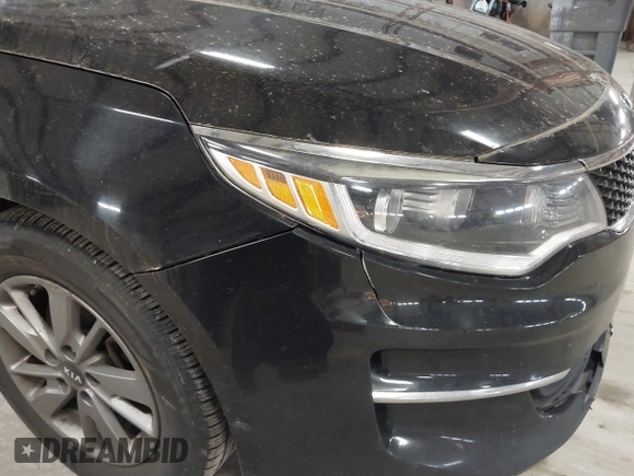 2016 Kia Optima LX Turbo with VIN 5XXGT4L16GG013751, listed as a IAAI auction lot 41843481 with 163,969 mi miles. Bid and sale history available at carsss.com. Image 19.