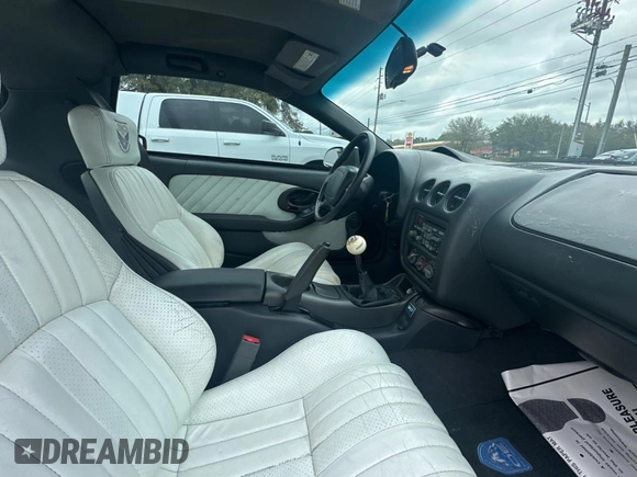 1999 Pontiac Firebird Formula with VIN 2G2FV22G7X2220315, listed as a Copart auction lot 46482085 with 107,524 mi miles and Clean title. Bid and sale history available at DreamBid. Image 5.