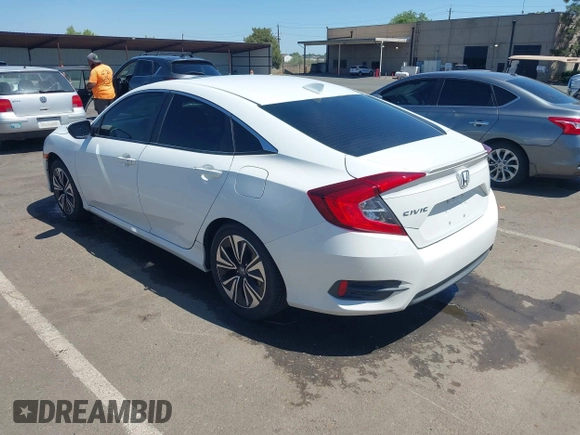 2016 Honda Civic EX-L z VIN 2HGFC1F83GH636374, wystawiony jako IAAI lot #42328432 z przebiegiem 130 738 mil mil oraz . Historia ofert i sprzedaży dostępna na DreamBid. Obrazek 3.
