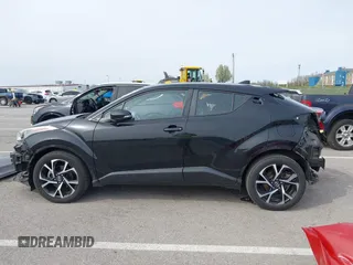 2018 Toyota C-HR XLE с VIN NMTKHMBX2JR016619, выставлен на аукционе IAAI как лот 41920426 с пробегом 95 627 миль миль и . История ставок и продаж доступна на DreamBid. Изображение 14.