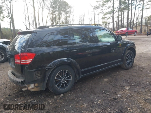 2018 Dodge Journey SE with VIN 3C4PDCAB3JT381836, listed as a IAAI auction lot 41351586 with 130,996 mi miles. Bid and sale history available at carsss.com. Image 4.