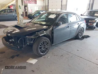 2014 Subaru WRX WRX Premium with VIN JF1GV7F63EG005928, listed as a IAAI auction lot 42140987 with 89,730 mi miles and . Bid and sale history available at DreamBid. Image 2.